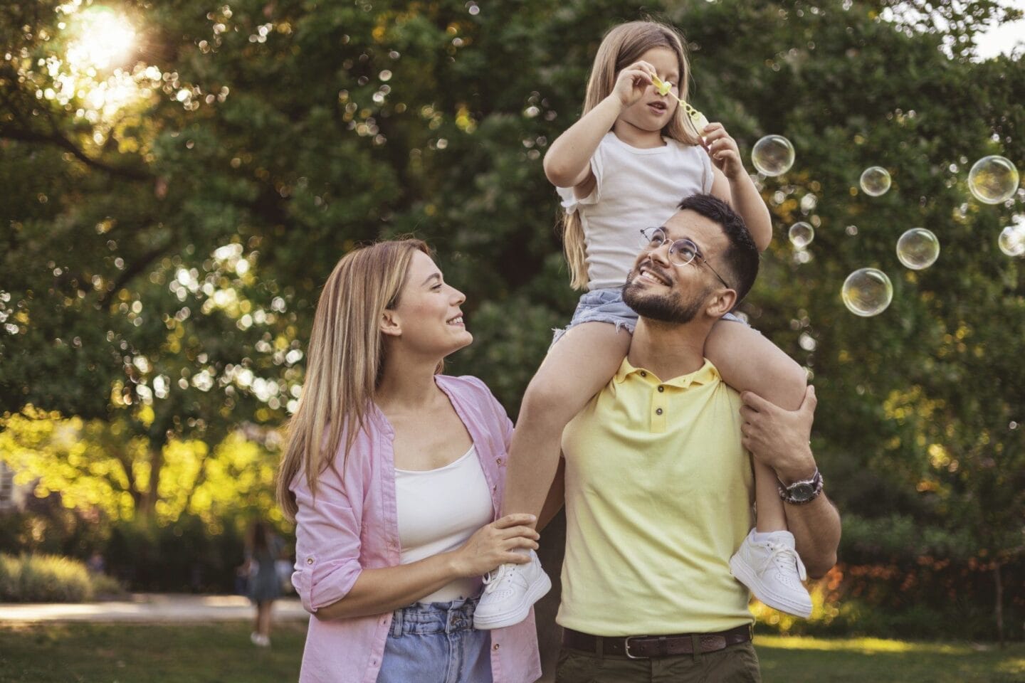 Family relaxing in a park near at Windsor Highwoods Preserve, Florida