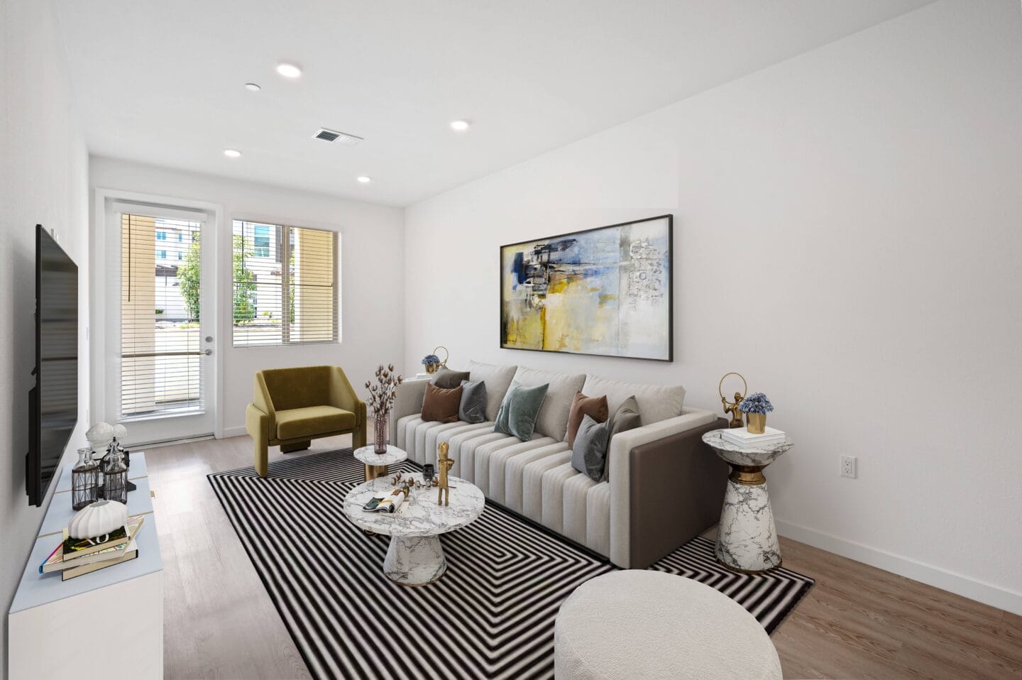 a living room with a couch and a rug