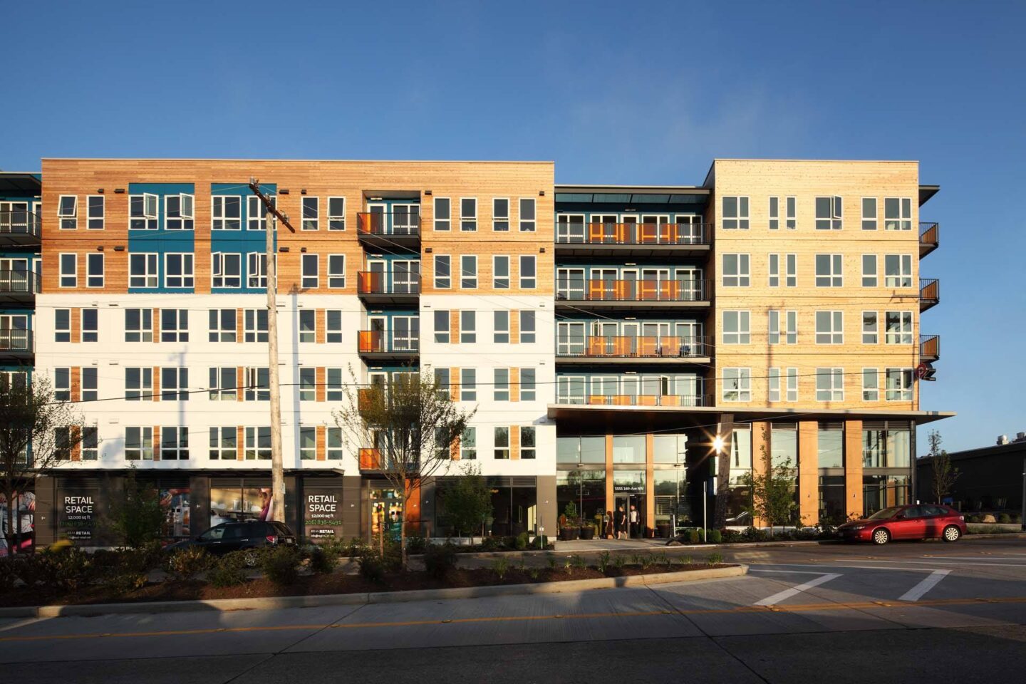 Building Exterior and parking lot at Windsor Ballard, 5555 14th Ave NW, Seattle, WA