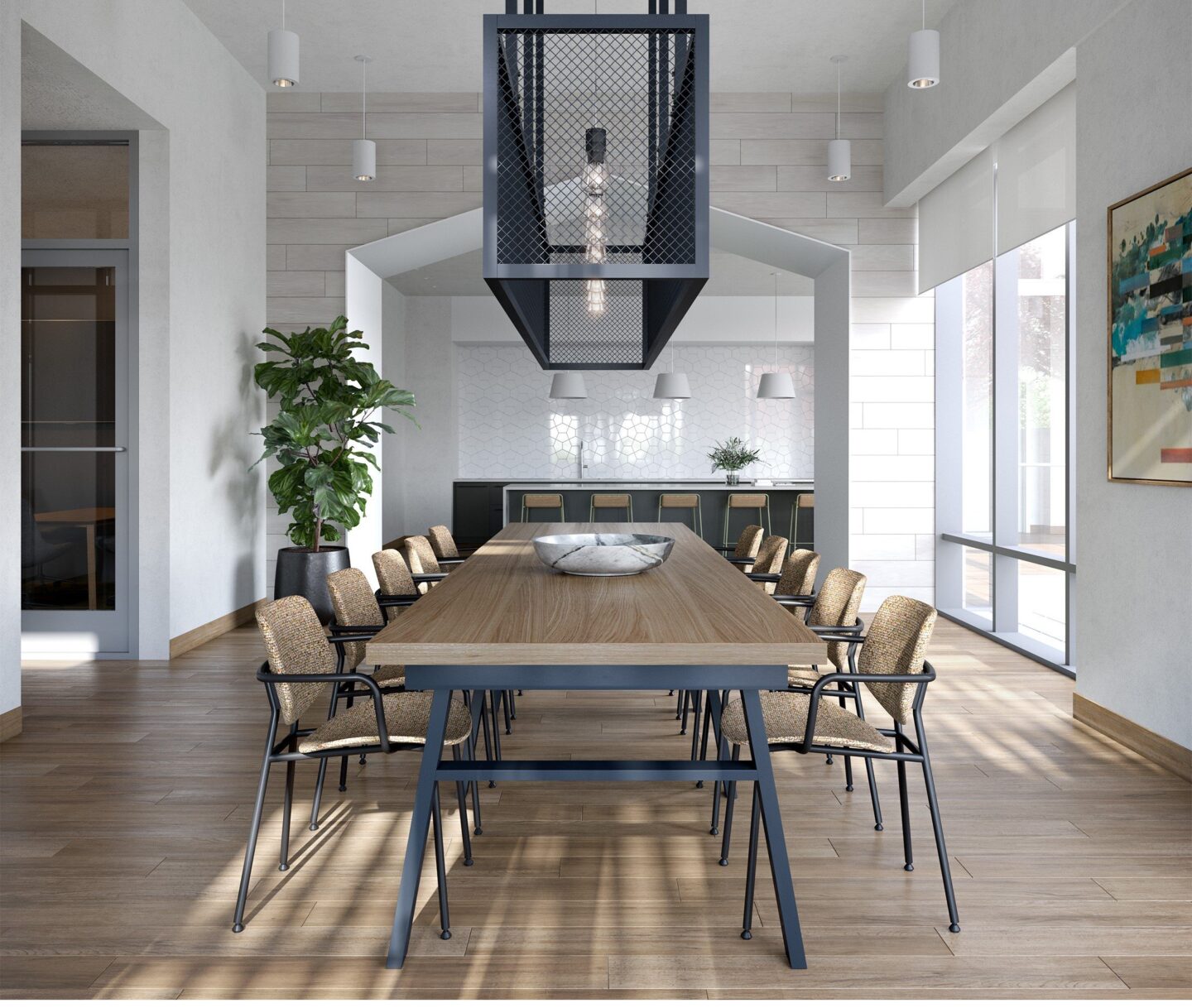 A modern lounge dining room with a large table and chairs at Windsor North + Vine 633 W North Ave, Chicago, IL 60610.