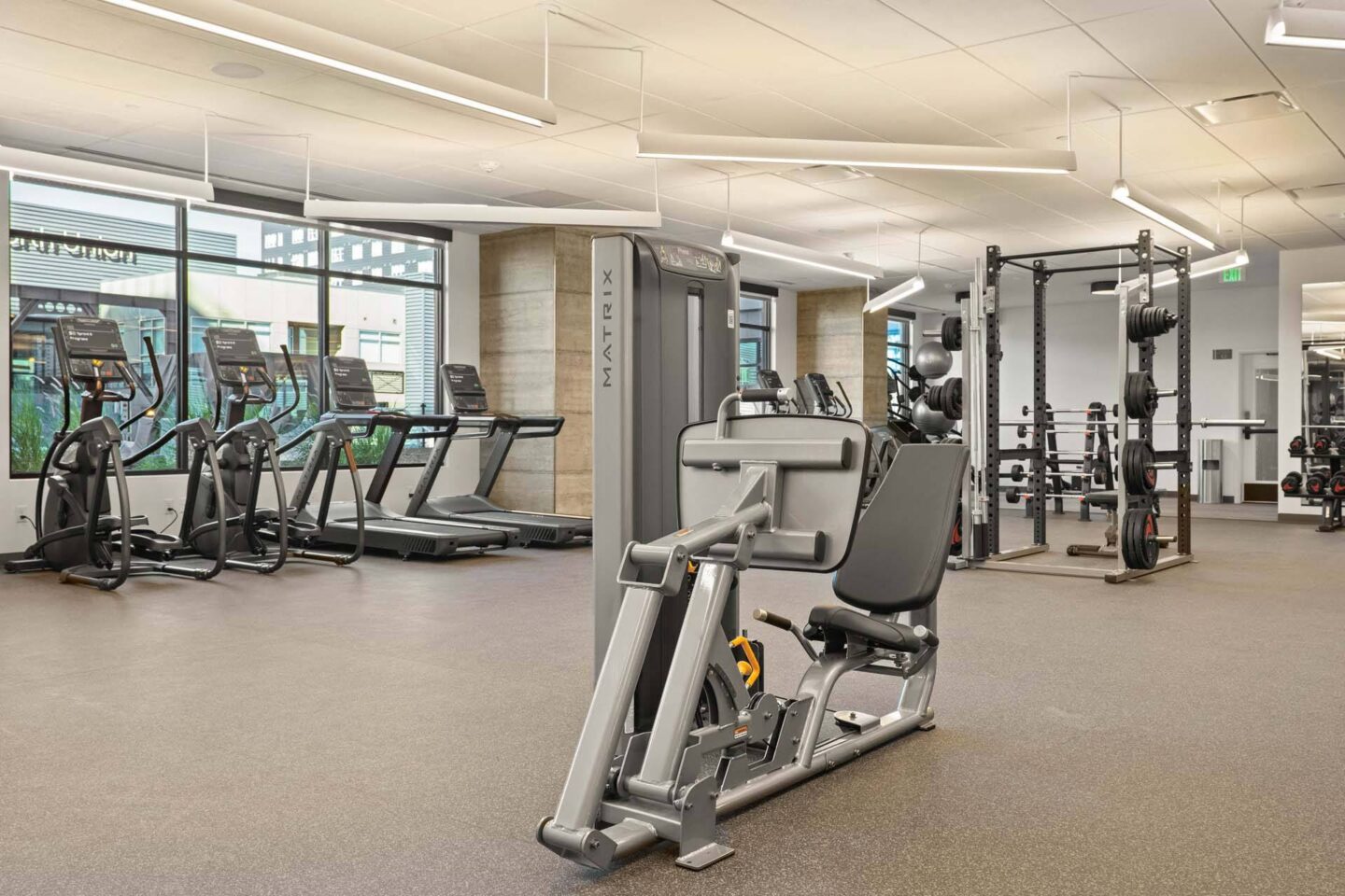 A fitness center with a variety of equipment including treadmills, weights, and exercise machines at Windsor 3000 Huron, 3000. N. Huron Street, Denver, CO 80202.