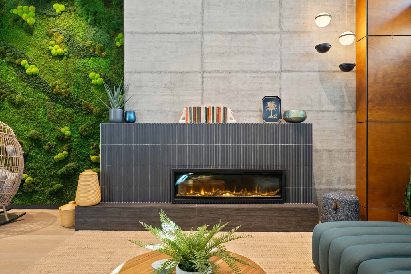 A modern fireplace and green wall at Windsor 3000 Huron, 3000. N. Huron Street, Denver, CO 80202.