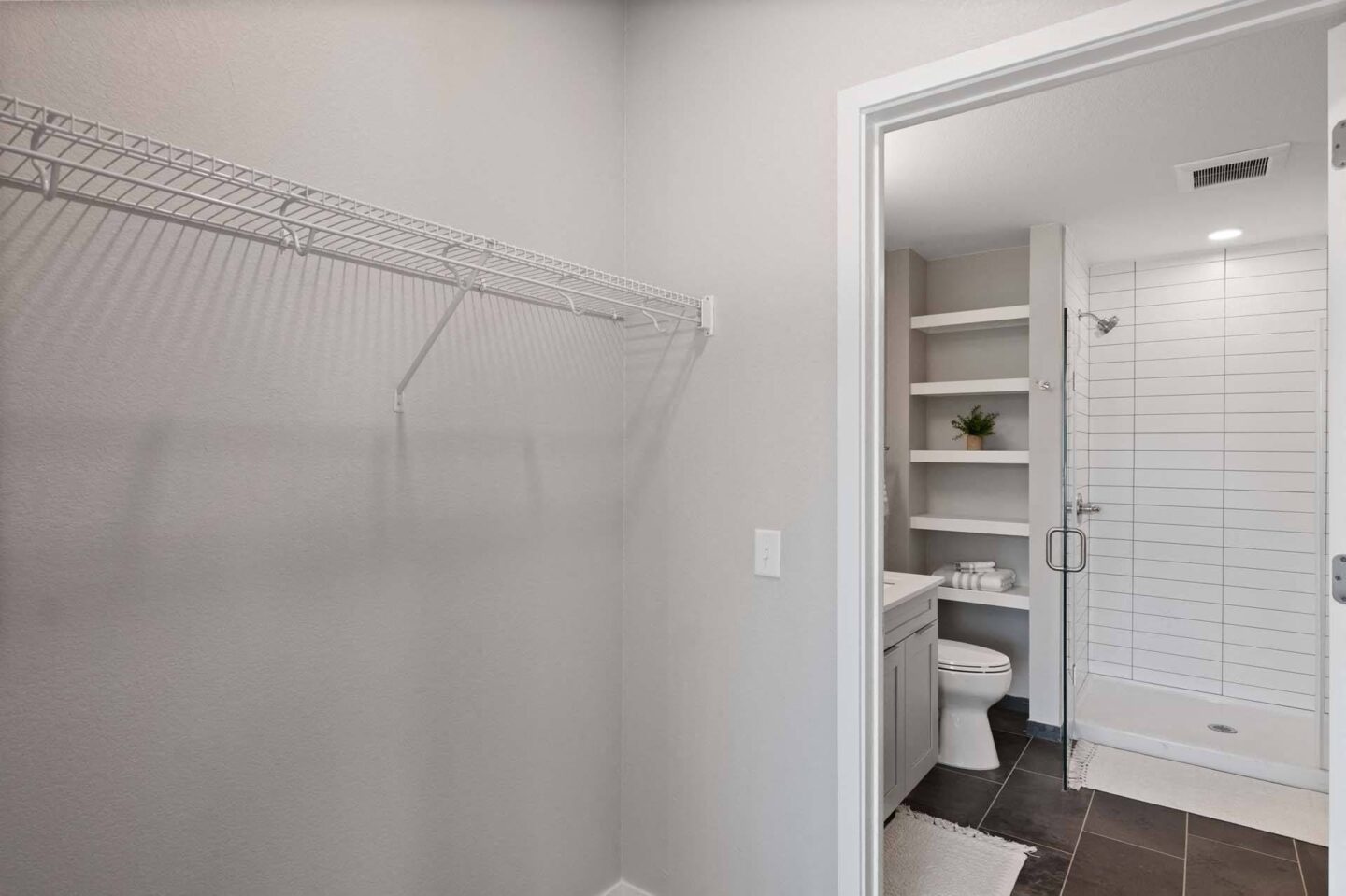 A spacious closet and bathroom at Windsor 3000 Huron, 3000. N. Huron Street, Denver, CO 80202.